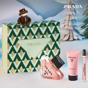 The Prada Paradoxe Gift Set Features Paradoxe Eau De Parfum 90ml, EDP Travel Spray 10ml and Body Lotion 50ml.