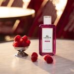 Lacoste Original Pour Femme opens with raspberries